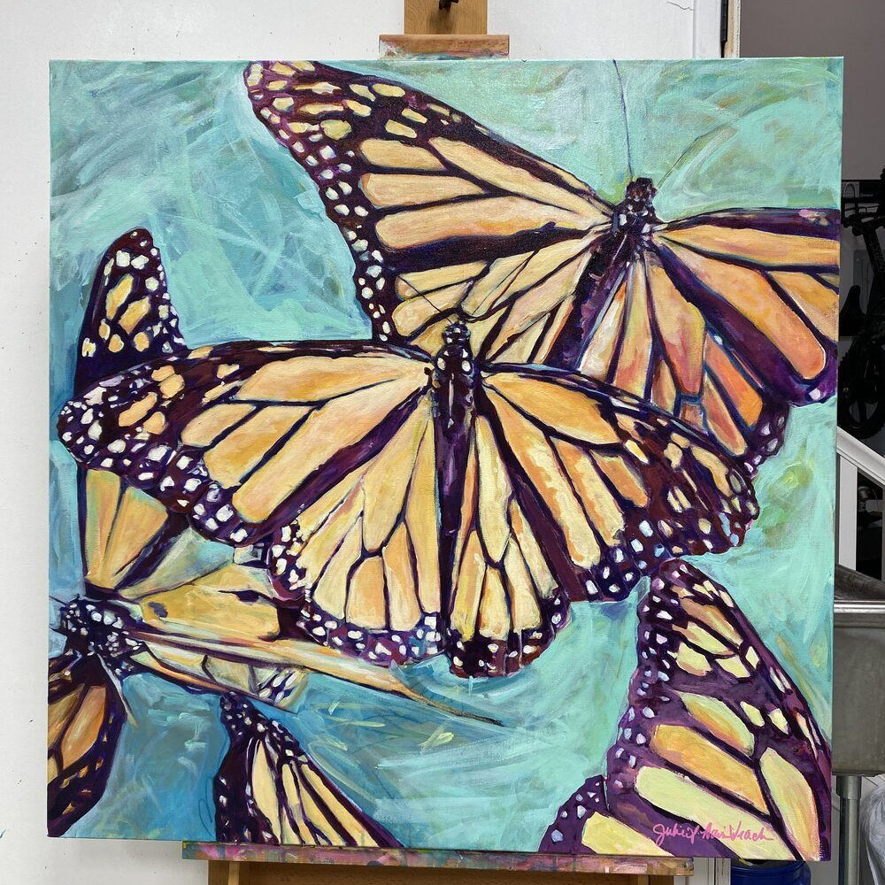 “Transformation Taking Flight” original painting on large canvas by Julie Davis pictured on an easle in her studio