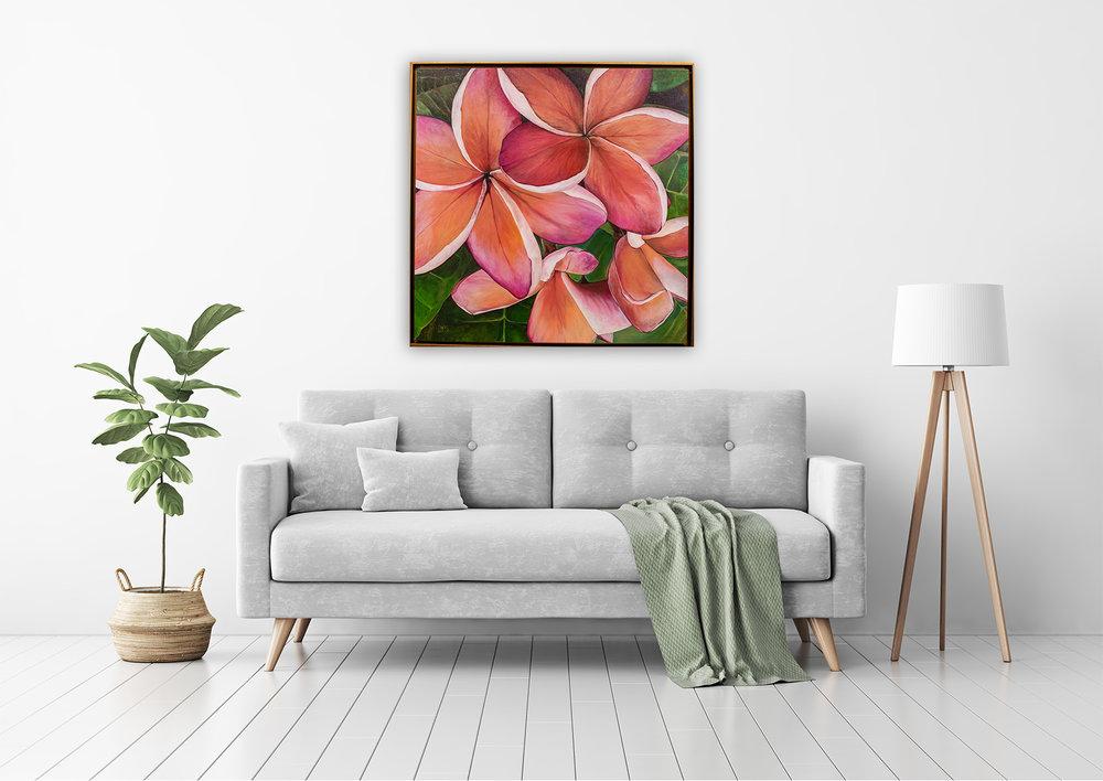 "Plumeria Love" original painting on canvas by Julie Davis displayed in contemporary bright living room interior