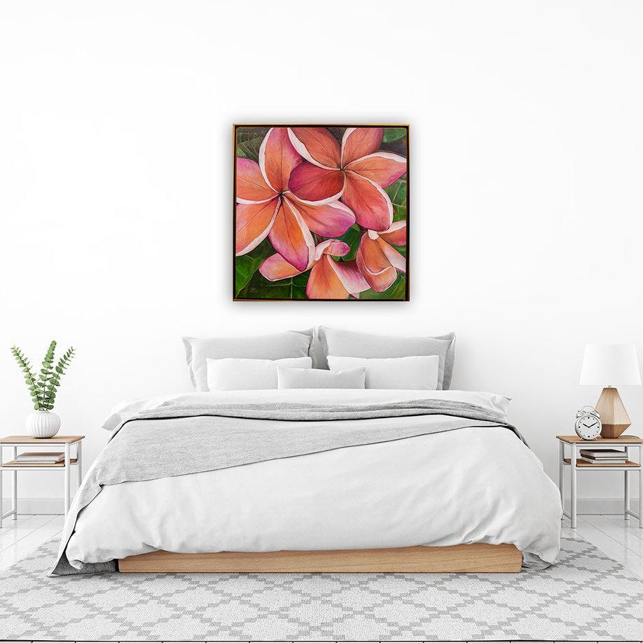 "Plumeria Love" original painting on canvas by Julie Davis in bright white bedroom