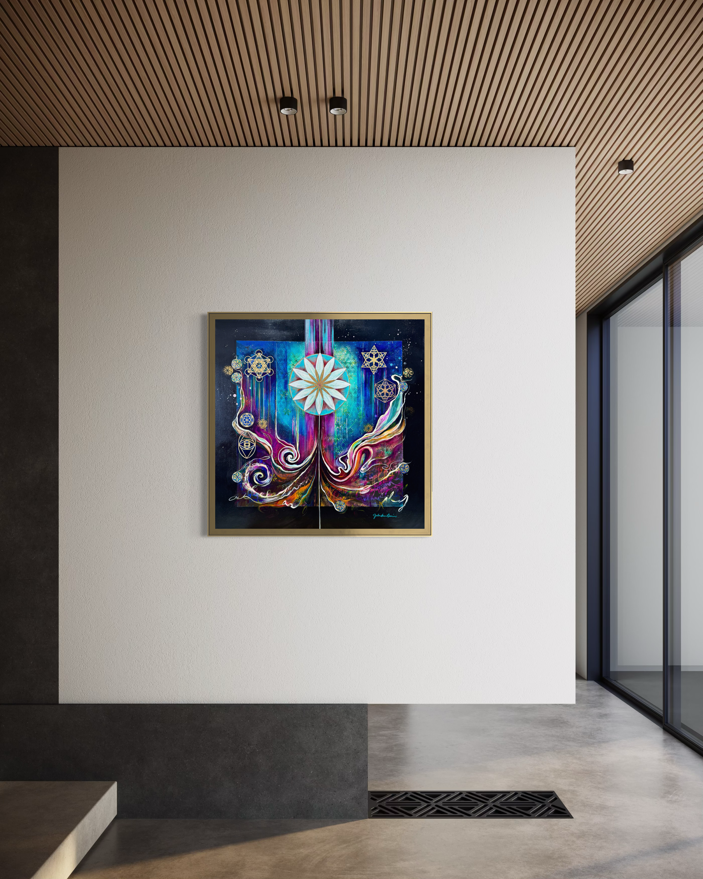 Colorful abstract painting on a white wall in a modern interior setting. Culminating Consciousness Sacred Geometry Art by Julie Davis.