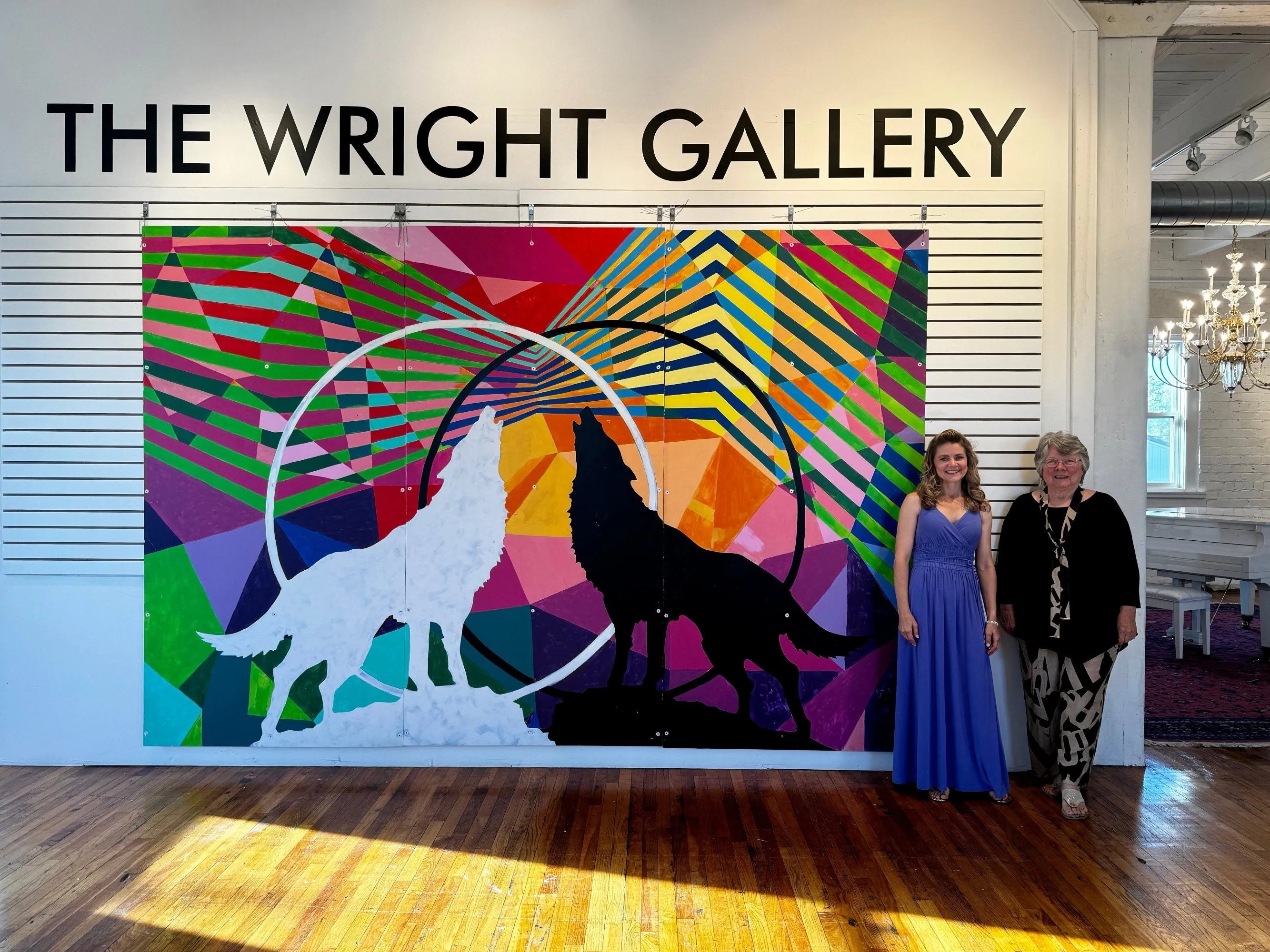 Resident artist, Julie Davis, and Karen Wright attend Davis' exhibition, "Full of Grace," the first to be held in the newly dedicated gallery space in honor of the Wright family, at the Sugar Creek Art Center (SCAC), Thorntown, Indiana. 