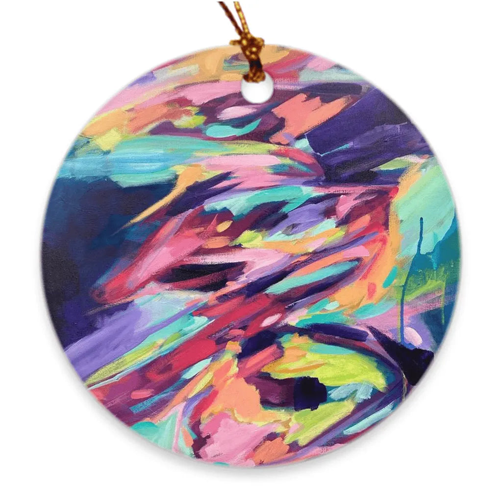 Front view of the circular-shaped "Resonance Rising" hand made porcelain ornament by Julie Davis