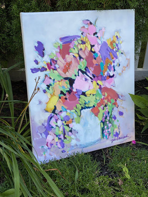 "Best Day Bouquet" 20x24" Original on Canvas by artist Julie Davis Veach displayed outside surrounded by a garden