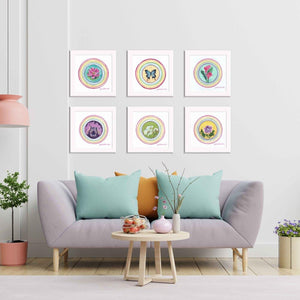 Bright cheerful living room with six framed paintings by Julie Davis Veach