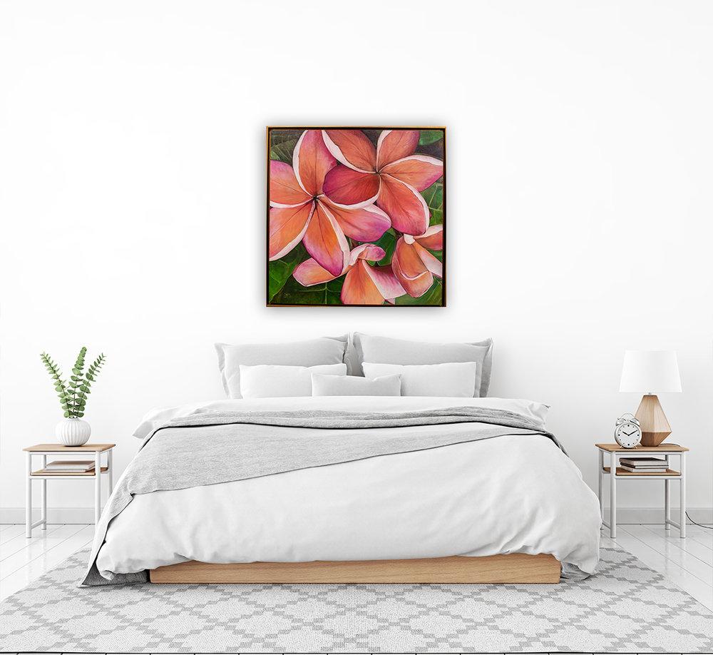 "Plumeria Love" original painting on canvas by Julie Davis in bright white bedroom