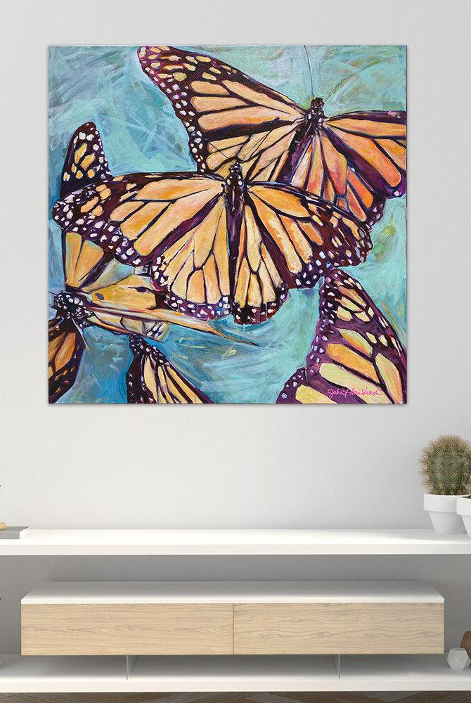 “Transformation Taking Flight” Original 36x36" on Large Canvas by Julie Davis Veach displayed in a bright modern interior