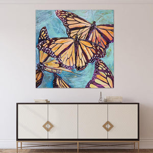 “Transformation Taking Flight” Original 36x36" on Large Canvas by Julie Davis Veach displayed in an art deco interior 